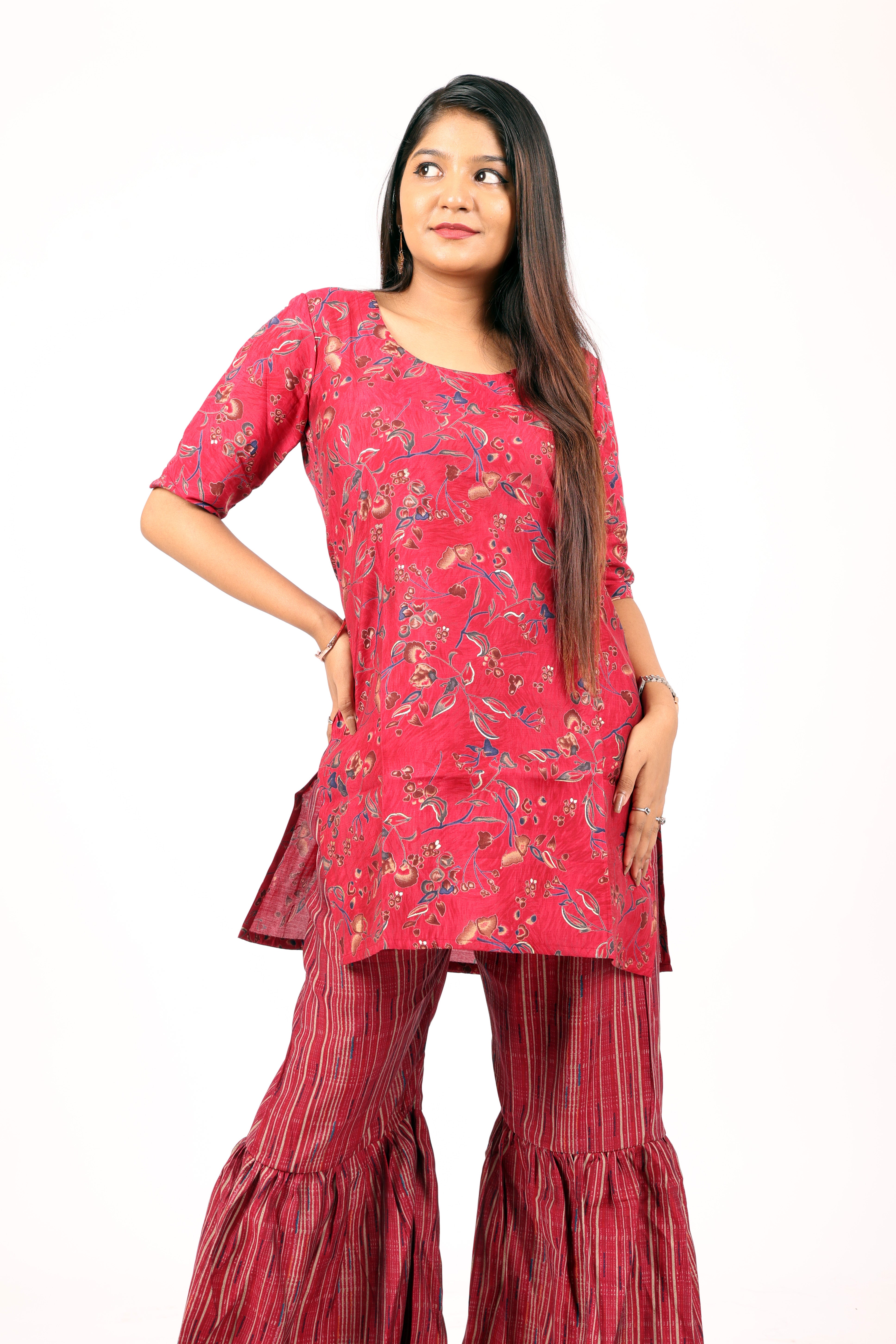 Ethnic style red floral-printed kurta and flared palazzo set.