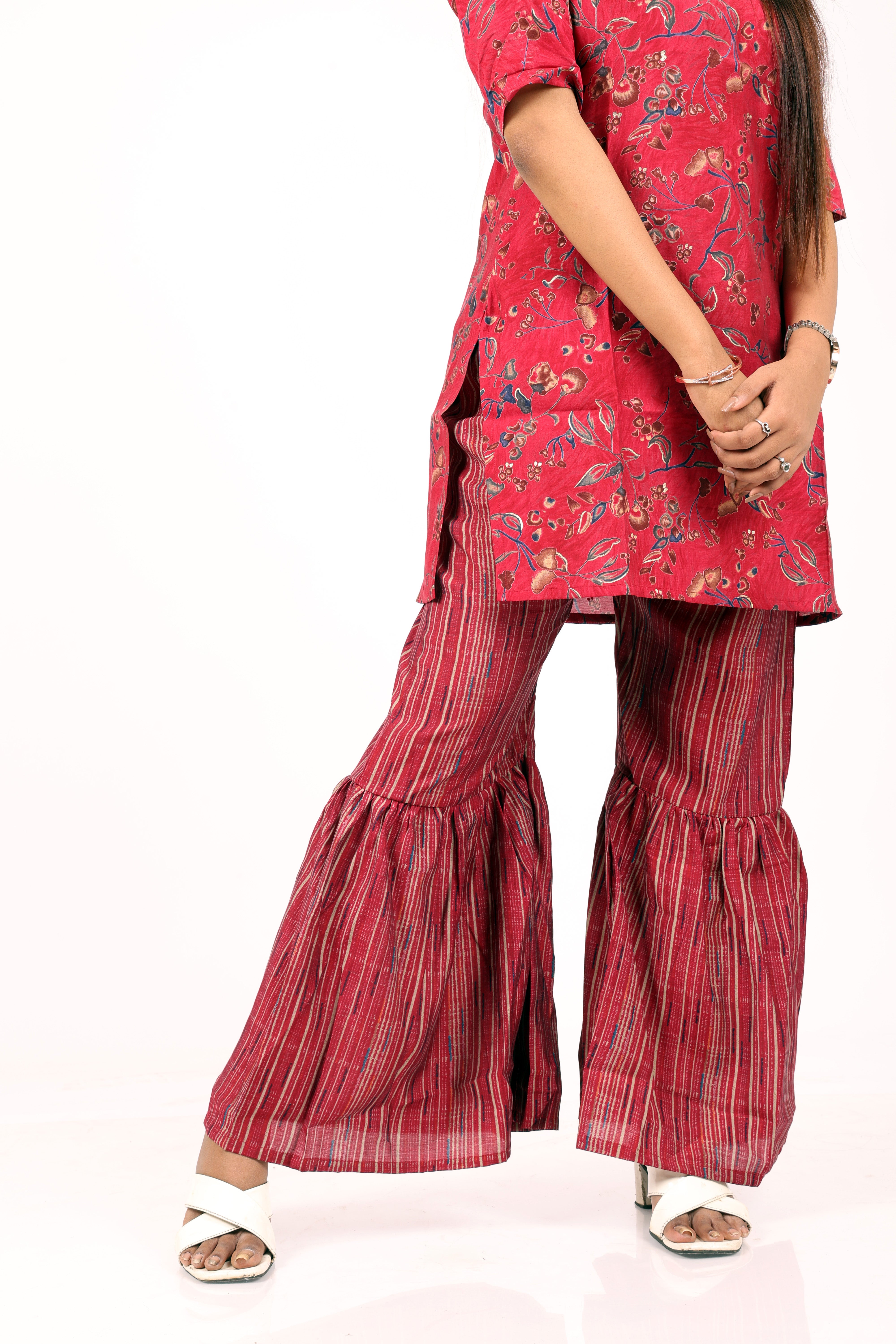 Ethnic style red floral-printed kurta and flared palazzo set.