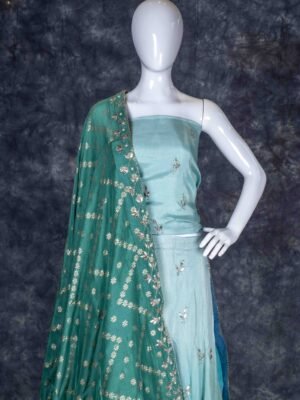 Semi-stitched teal lehenga set with silver zari and bead work