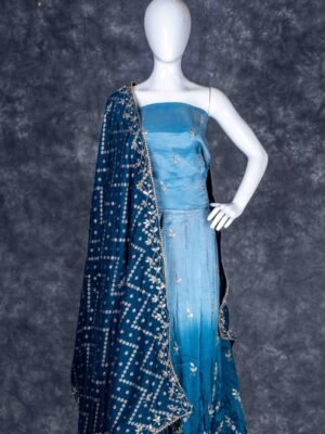 Semi-stitched teal blue lehenga set with silver zari and bead work