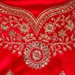 Semi-stitched red velvet lehenga set with gold zari and stone work