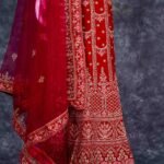 Semi-stitched red velvet lehenga set with silver zari and stone work