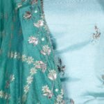 Semi-stitched teal lehenga set with silver zari and bead work