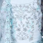 Semi-stitched pastel blue lehenga set with silver zari and stone work